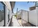 Side yard featuring an outdoor shower, landscaping, and a privacy fence at 7607 22Nd W Ave, Bradenton, FL 34209