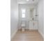 Bathroom features a single sink vanity with granite countertop and gold fixtures at 7607 22Nd W Ave, Bradenton, FL 34209