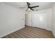 Bright bedroom with wood floors, ceiling fan, closet and access to ensuite bathroom at 7607 22Nd W Ave, Bradenton, FL 34209