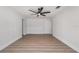 Bedroom with wood floors and an ensuite bathroom at 7607 22Nd W Ave, Bradenton, FL 34209