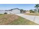 Well-maintained one-story home featuring a long driveway and two-car garage at 7607 22Nd W Ave, Bradenton, FL 34209