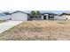 Charming one-story home featuring a modern exterior and two palm trees in the front yard at 7607 22Nd W Ave, Bradenton, FL 34209