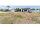 Inviting one-story home with manicured lawn, a fenced yard, and a two-car garage at 7607 22Nd W Ave, Bradenton, FL 34209