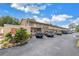 Exterior shot showing ample parking space available near the units, providing convenience for residents and guests at 8039 Garden Dr # 105, Seminole, FL 33777