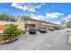 Exterior shot showing ample parking space available near the units, providing convenience for residents and guests at 8039 Garden Dr # 105, Seminole, FL 33777