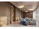 Relaxation room with plush lounge chairs and decorative shelves for a modern and spa-like ambiance at 805 S Gulfview Blvd # 402B, Clearwater, FL 33767