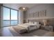 Serene main bedroom with a large window and views of the water at 805 S Gulfview Blvd # 602A, Clearwater, FL 33767
