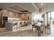 Modern kitchen with sleek countertops, stainless steel appliances, and a dining area with stunning water views at 805 S Gulfview Blvd # 701B, Clearwater, FL 33767