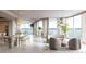 Open-concept living room with floor-to-ceiling windows, dining area, and stylish furnishings with water views at 805 S Gulfview Blvd # 701B, Clearwater, FL 33767
