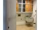Functional laundry room includes sink and built-in cabinetry, offering practical space for laundry tasks and storage at 8130 Shalom Dr, Spring Hill, FL 34606