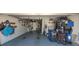 Spacious garage with ample storage, shelving, and organization options at 834 Tremont Greens Ln # 137, Sun City Center, FL 33573