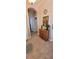 Inviting hallway with stylish console table and decorative elements at 834 Tremont Greens Ln # 137, Sun City Center, FL 33573