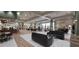 Expansive lobby area with comfortable seating, elegant decor, and plenty of natural light at 834 Tremont Greens Ln # 137, Sun City Center, FL 33573