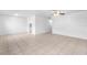 Spacious living room with tile floors and a ceiling fan at 9130 Tudor Dr # M105, Tampa, FL 33615