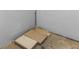 The unfinished basement space is ready for flooring and features concrete walls at 9130 Tudor Dr # M105, Tampa, FL 33615
