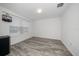 Empty bedroom featuring a large window, plank floors and natural light at 9647 Summers Cay Cir, Thonotosassa, FL 33592