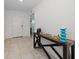 Foyer featuring ceramic tile floors and a decorative table at 9647 Summers Cay Cir, Thonotosassa, FL 33592