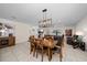 Open concept living space featuring dining area and living room at 9647 Summers Cay Cir, Thonotosassa, FL 33592