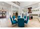 Spacious living room with view of dining room and kitchen with large island at 18258 Wayne Rd, Odessa, FL 33556
