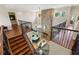 Second story view of the living room with fireplace and access to the other rooms at 18258 Wayne Rd, Odessa, FL 33556