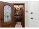 Wine cellar featuring custom wine racks and a decorative wrought iron door at 18258 Wayne Rd, Odessa, FL 33556