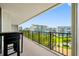 Enjoy this lovely balcony view from this condo featuring beautiful green space and surrounding buildings at 100 Oakmont Ln # 802, Belleair, FL 33756