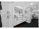 Modern bathroom featuring a double vanity with lighted mirror at 100 Oakmont Ln # 802, Belleair, FL 33756