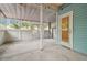 An attached screened porch provides an ideal outdoor living space at 105 1St Se Ave, Lutz, FL 33549