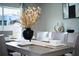 Formal dining table setting with elegant decor, perfect for entertaining guests and Gathering at 10826 Trailing Vine Dr, Tampa, FL 33610