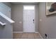 Bright entryway with stairs and tiled floor at 10826 Trailing Vine Dr, Tampa, FL 33610