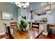 An elegant dining area with access to a fully equipped kitchen at 11606 Quiet Forest Dr, Tampa, FL 33635