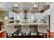 Bright kitchen boasts stainless appliances, ample cabinet space, and a large island with bar seating at 11606 Quiet Forest Dr, Tampa, FL 33635