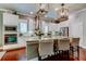 Beautiful kitchen features stainless steel appliances, granite countertops, and custom cabinets at 11606 Quiet Forest Dr, Tampa, FL 33635