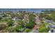 Aerial view of the neighborhood, showcasing lush greenery and easy access to bay at 11764 Pinedale Ave, Seminole, FL 33772