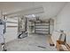 A garage with shelves and new doors at 11764 Pinedale Ave, Seminole, FL 33772