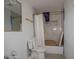 Bathroom renovation with marble-look tile, new fixtures, and ready for finishing touches at 1185 36Th Ne Ave, St Petersburg, FL 33704
