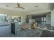 Renovated living room with large windows, recessed lighting, and tile flooring at 1185 36Th Ne Ave, St Petersburg, FL 33704