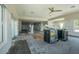 Bright, renovated living room featuring tile flooring, recessed lighting, and large windows at 1185 36Th Ne Ave, St Petersburg, FL 33704