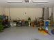 Spacious two car garage showing ample storage room and a clean, well maintained floor at 12271 Centralia Rd, Weeki Wachee, FL 34614