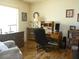 Bright office space with wood floors, built-in shelves, and an inviting workspace at 12271 Centralia Rd, Weeki Wachee, FL 34614