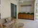 Covered patio with comfortable seating, built-in cabinets, and a relaxing atmosphere at 12271 Centralia Rd, Weeki Wachee, FL 34614