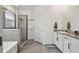 Bright bathroom featuring modern fixtures and a glass shower at 12517 Nantahala Run, Parrish, FL 34219