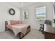 Bright bedroom with natural light and modern decor at 12517 Nantahala Run, Parrish, FL 34219