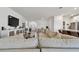 Expansive living room with TV and an open concept design at 12517 Nantahala Run, Parrish, FL 34219