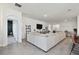 Open living room featuring tile floors, TV, and stylish decor at 12517 Nantahala Run, Parrish, FL 34219