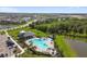 Community pool with lounge chairs and covered area in a neighborhood filled with beautiful homes at 12517 Nantahala Run, Parrish, FL 34219