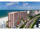 Elegant condo towers showcase beautiful landscaping, tennis courts, and scenic ocean views at 1310 Gulf Blvd # 6C, Clearwater Beach, FL 33767