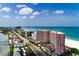 Beautiful coastal community featuring condo buildings, beach access, and waterway views at 1310 Gulf Blvd # 6C, Clearwater Beach, FL 33767