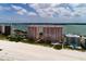 High-angle view of beachfront condo buildings offering stunning ocean views and easy beach access at 1310 Gulf Blvd # 6C, Clearwater Beach, FL 33767
