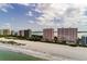 Stunning aerial view of beach condos with ocean views and sandy beach at 1310 Gulf Blvd # 6C, Clearwater Beach, FL 33767